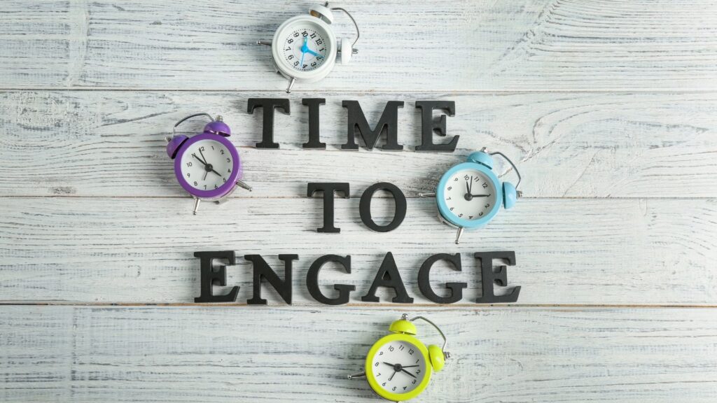 Image of alarm clocks and text which says "Time to Engage" - Field 1 Post Digital Marketing